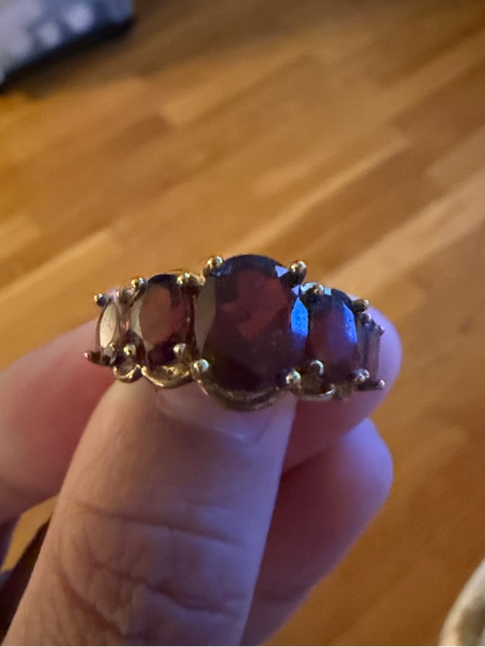 Gold Band Ring with Three Garnet-Red Gemstones